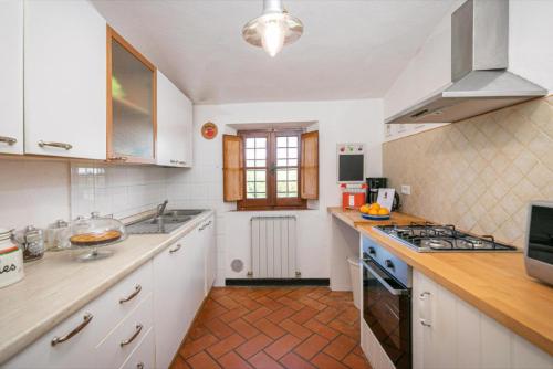 Η κουζίνα ή μικρή κουζίνα στο Villa Mealli