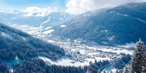 a view of a snow covered valley in a mountain at Appartement Gschwandtner in Eben im Pongau