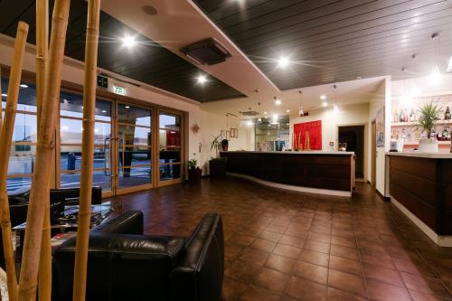 Χώρος καθιστικού στο Motel Hotel Piranha