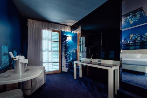 Ένα ή περισσότερα κρεβάτια σε δωμάτιο στο Motel Hotel Piranha