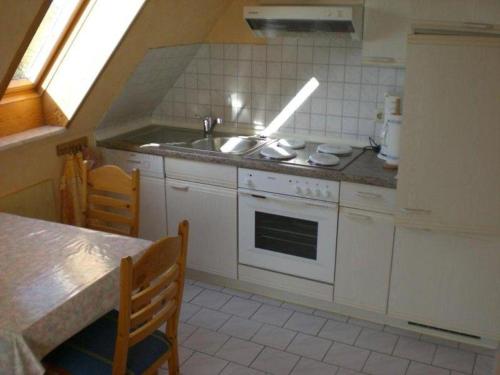 A cozinha ou kitchenette de Letztes Haus vorm Wasser (2)