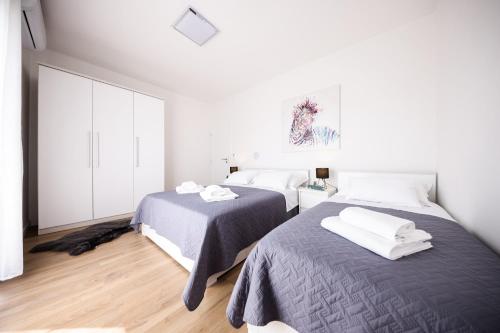 Cama ou camas em um quarto em Villa Visum