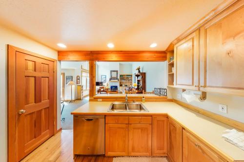 a kitchen with wooden cabinets and a sink at Deer Point #1 in Park City