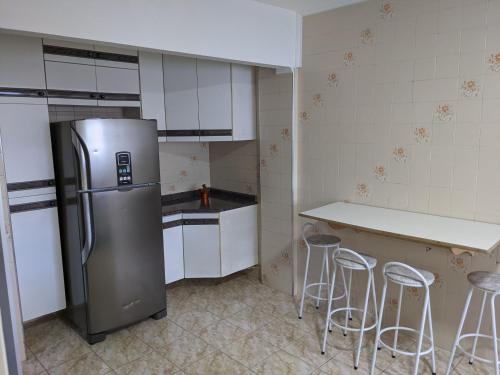 Kuchyň nebo kuchyňský kout v ubytování Apartamento VIP Centro Serra Negra - Familiar
