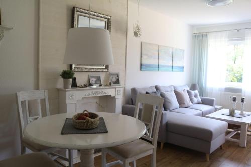 אזור ישיבה ב-Ferienwohnung-Moorberg-mit-schoener-Terrasse-in-ruhiger-Lage