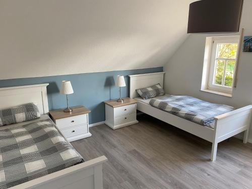 Voodi või voodid majutusasutuse Ferien-am-Uhlenmeer Keine-Monteure toas
