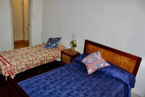 Una cama o camas en una habitación de Hotel Bahia