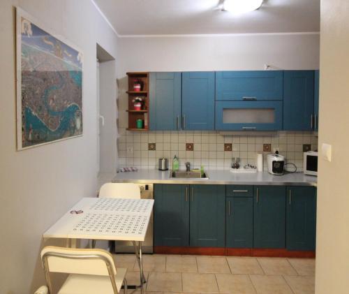 Dapur atau dapur kecil di Apartament Podróże Małe i Duże