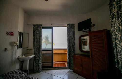 Koupelna v ubytování Hotel Candilejas Playa