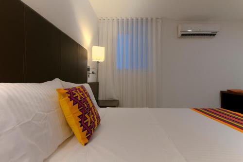 Cama o camas de una habitación en Hotel Taroa