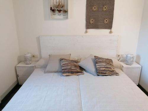 Ein Bett oder Betten in einem Zimmer der Unterkunft Casa Verano eterno, Villa tot 16 personen
