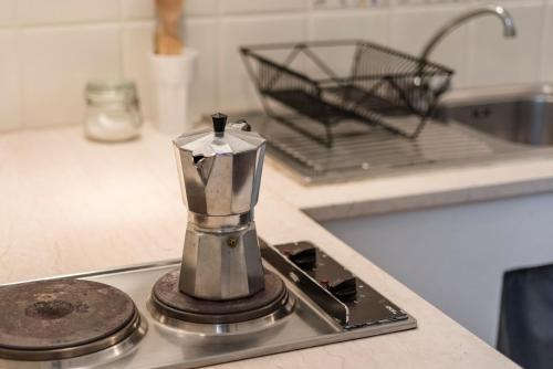 a coffee maker on a counter in a kitchen at Agriturismo San Ottaviano in Monterotondo