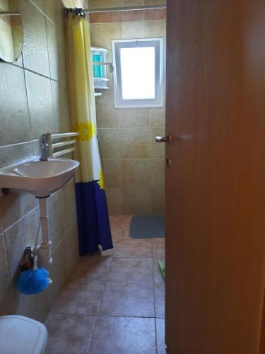 Koupelna v ubytování Sapir Apartment