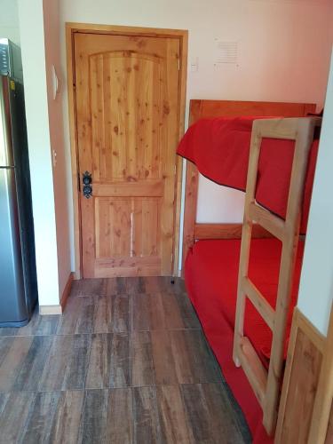 Katil atau katil-katil dalam bilik di Terra Newen Pucon Family Suites