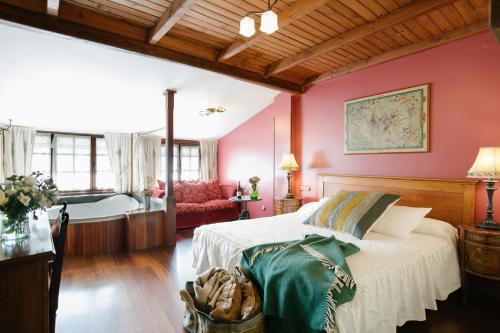 Säng eller sängar i ett rum på La Moncloa de San Lazaro