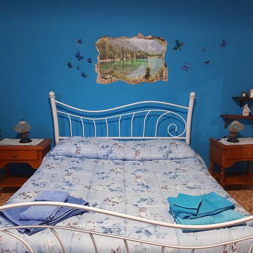 Postel nebo postele na pokoji v ubytování B&B Da Andreina
