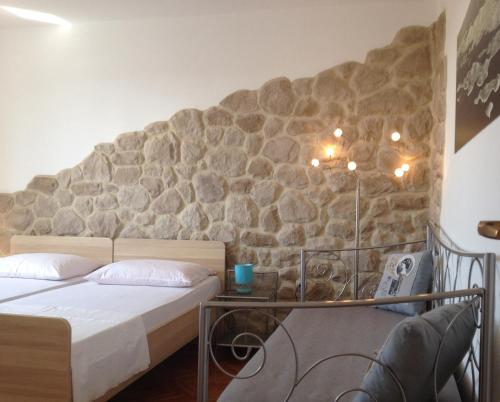 Posteľ alebo postele v izbe v ubytovaní Apartments Ana+3