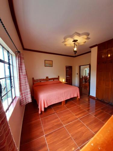Cama o camas de una habitación en Hotel Posada San Javier