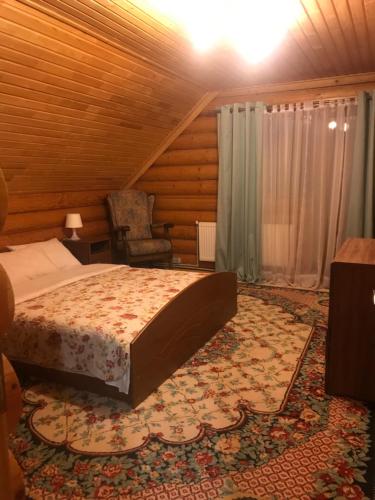 Кровать или кровати в номере Cottage Karinka