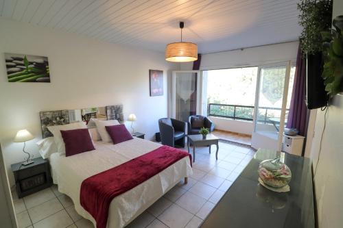 Ένα ή περισσότερα κρεβάτια σε δωμάτιο στο Locations appartements standing Amélie-les-bains