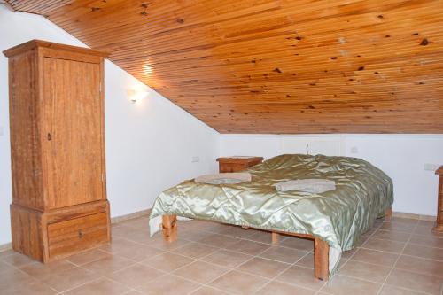 מיטה או מיטות בחדר ב-Villa Ahad