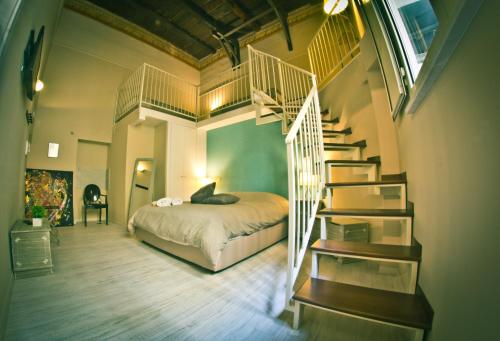 Postel nebo postele na pokoji v ubytování I Visconti