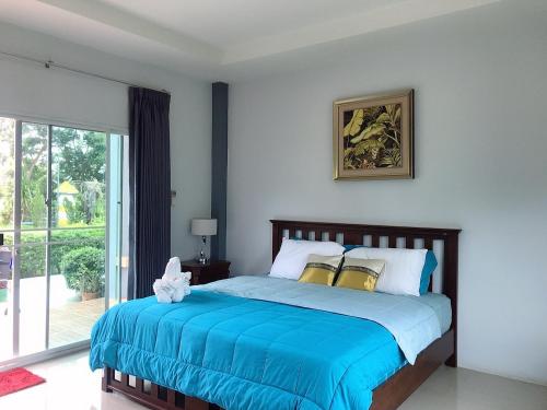 Postel nebo postele na pokoji v ubytování Ok Farm Resort