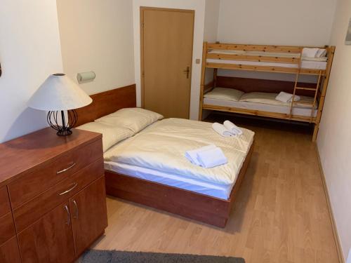 Postel nebo postele na pokoji v ubytování Apartmán B13 Tatran Donovaly