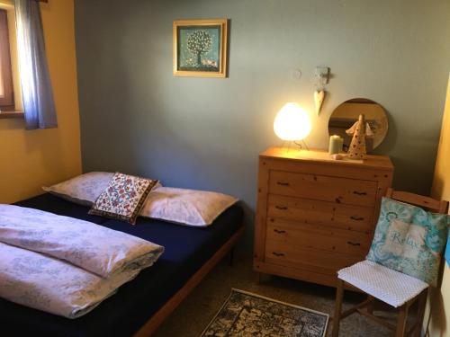 Postel nebo postele na pokoji v ubytování Chata Modrá útulna Tyra