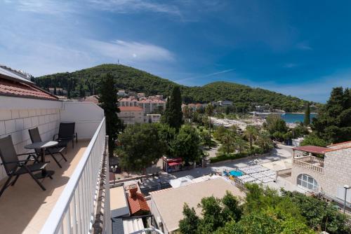 a balcony with a view of a city at Hotel Perla in Dubrovnik