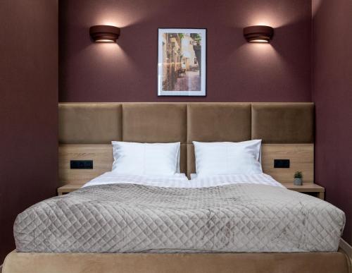 Ліжко або ліжка в номері Stare Misto Premium Apartment