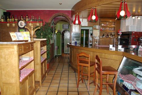 Lounge nebo bar v ubytování Apartamentos Turisticos de Hospedaje Don Diego