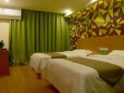 Katil atau katil-katil dalam bilik di Vatica Suzhou Yongqiao District Yinhe 2 Road Wanda Plaza Hotel
