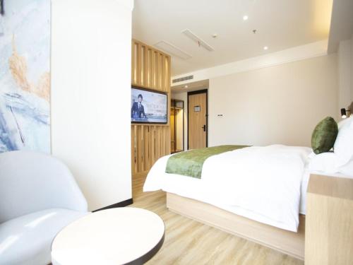 Katil atau katil-katil dalam bilik di GreenTree Inn Ankang Bashan Middle Road