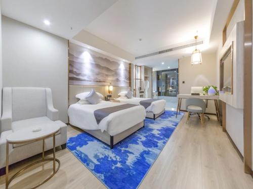 Φωτογραφία από το άλμπουμ του GreenTree Eastern Kunming Baiyun Road Tongde Square Hotel σε Kunming