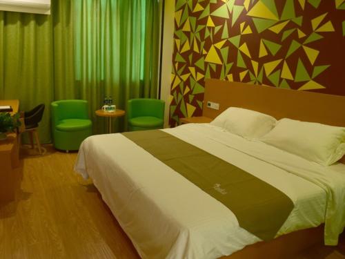 Katil atau katil-katil dalam bilik di Vatica Suzhou Yongqiao District Yinhe 2 Road Wanda Plaza Hotel