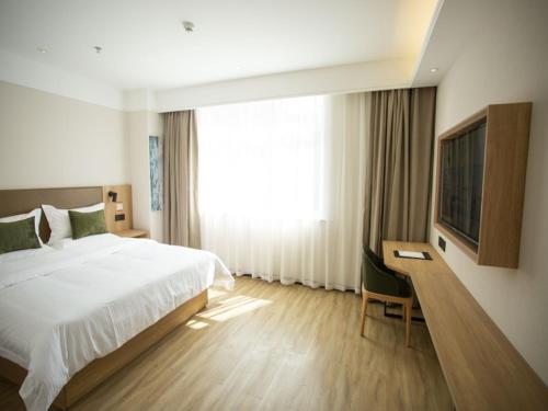 Katil atau katil-katil dalam bilik di GreenTree Inn Ankang Bashan Middle Road
