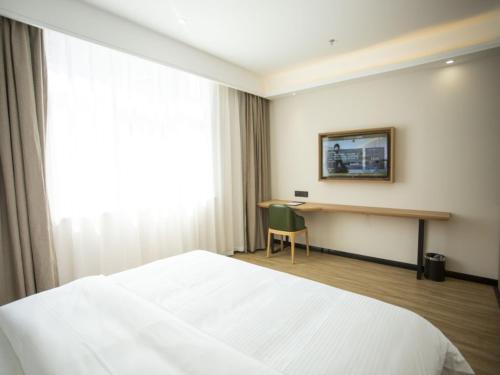 Televisyen dan/atau pusat hiburan di GreenTree Inn Ankang Bashan Middle Road