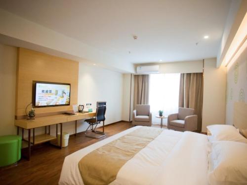 Katil atau katil-katil dalam bilik di GreenTree Inn Jinan Tangye Express Hotel