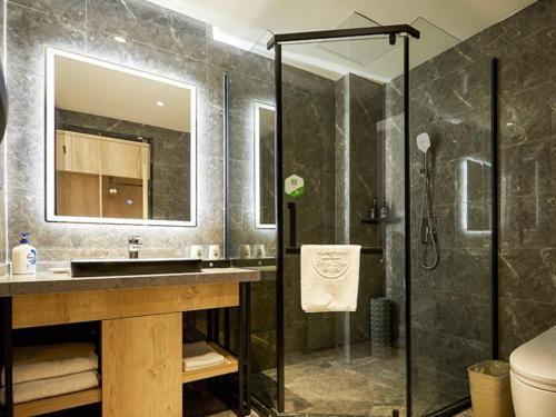 Ένα μπάνιο στο GreenTree Inn Jiangsu Nantong Textile City Bus Station Express Hotel