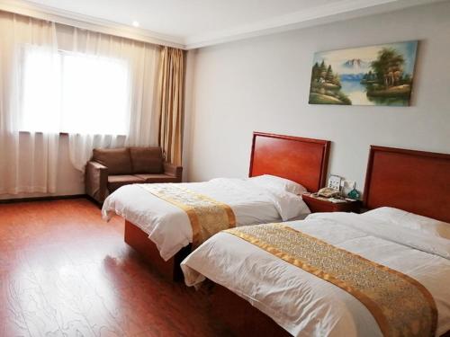 Krevet ili kreveti u jedinici u objektu GreenTree Inn Shanghai Meilan Lake Hutai Road Express Hotel