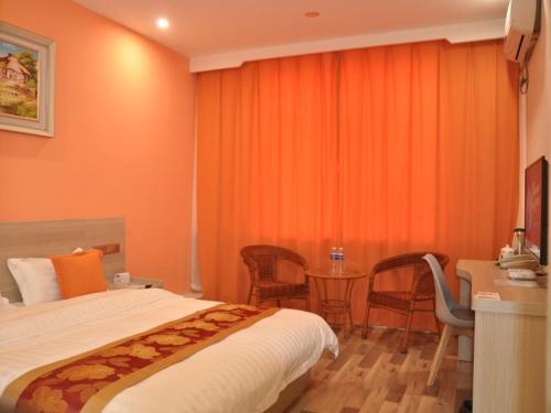 Shell Tianshui Taian County Bus Station Hotelにあるベッド