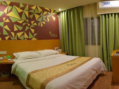 Katil atau katil-katil dalam bilik di Vatica Suzhou Yongqiao District Yinhe 2 Road Wanda Plaza Hotel