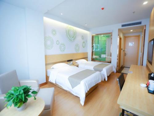 GreenTree Inn Jin Intermediary Resting Dingyang West Road Express Hotel 객실 침대