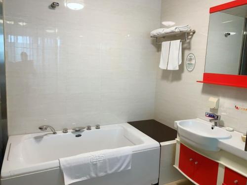 Ένα μπάνιο στο GreenTree Alliance Jiangsu Wuxi Yixing jinsanjiao Bus Station Hotel