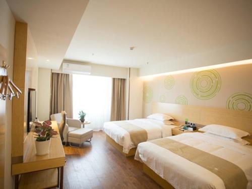 Katil atau katil-katil dalam bilik di GreenTree Inn Jinan Tangye Express Hotel