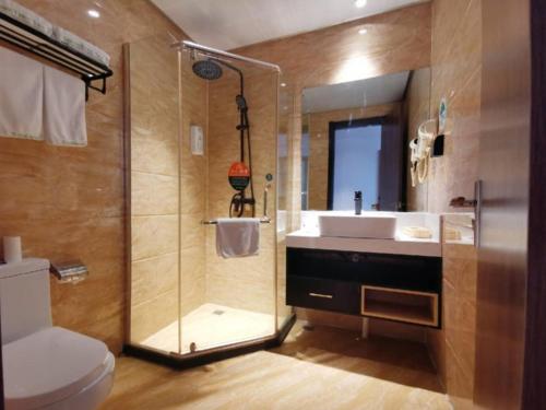 Ένα μπάνιο στο GreenTree Inn Anhui Lu’an Huoshan Yingjia Avenue Business Hotel
