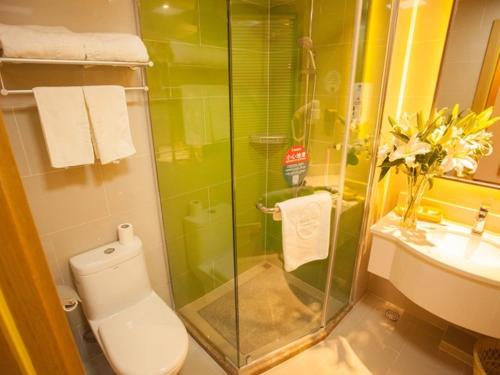 Ένα μπάνιο στο GreenTree Inn Jiangsu Nanjing Jiangning University Chenjiaoyuan Metro Station Express Hotel