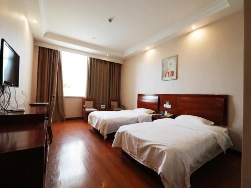 Katil atau katil-katil dalam bilik di GreenTree Inn Zhejiang Zhoushan Xincheng Business Hotel