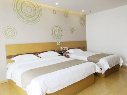 Imagen de la galería de GreenTree Inn Henan Jiaozuo Mengzhou Huifeng Road Express Hotel, en Meng